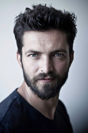 Илькер Кызмаз